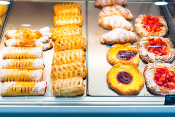 Various Cakes In A Bakery's Display