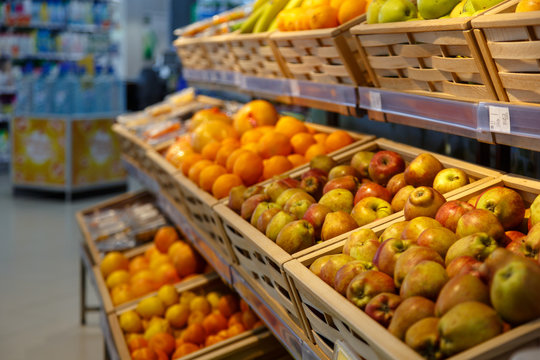 Shopping showcase in the supermarket with vegetables and fruit.