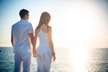 Young Couple By The Sea