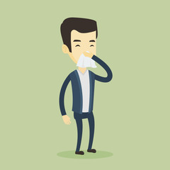 Young asian sick man sneezing.