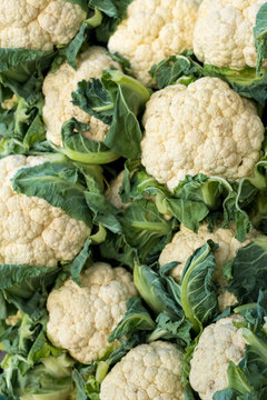 organic white cauliflower on sale in the grocery stall in summer