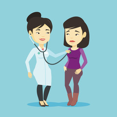 Obraz premium Doctor listening to chest of patient.