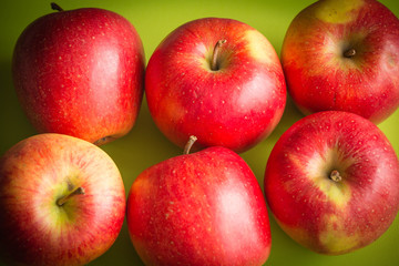 Juicy apple on a green background