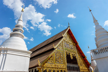 Fototapeta premium THAILAND,CHAINGMAI-Mar 12, 2017: suan dok temple. view of the amazing golden and white buiding.
