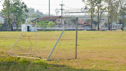Fototapeta na wymiar Soccer goal Old in the lawn