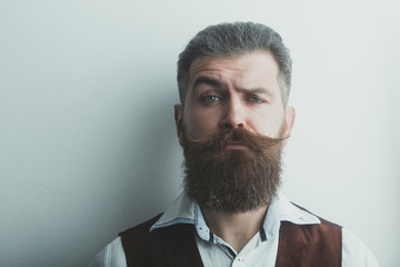 bearded man, brutal caucasian hipster with serious face