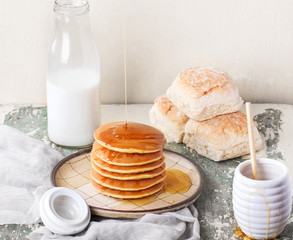 Pancakes with honey and milk