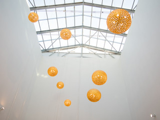 Interior of the modern building, shopping mall background. look on the atrium of modern commercial...