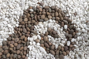 top view of white and brown rocks as background in garden