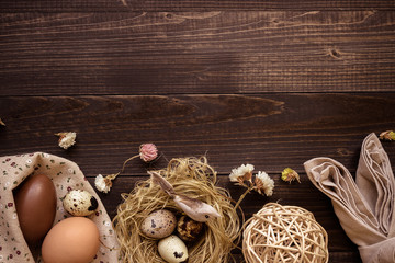 Happy easter. Easter eggs and easter decoration on the wooden table