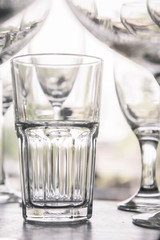 water glass on the shelves , Drinking water container, Empty water glass