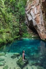 Girl at Encanto Azul (Blue Enchantment) - Natural Lake at Riachao, Maranhao, Brazil