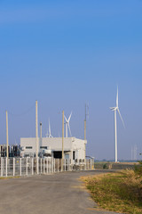 Fototapeta na wymiar Electric power station with wind turbines power generator