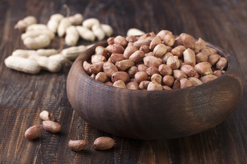 Peanuts in a wooden bowl