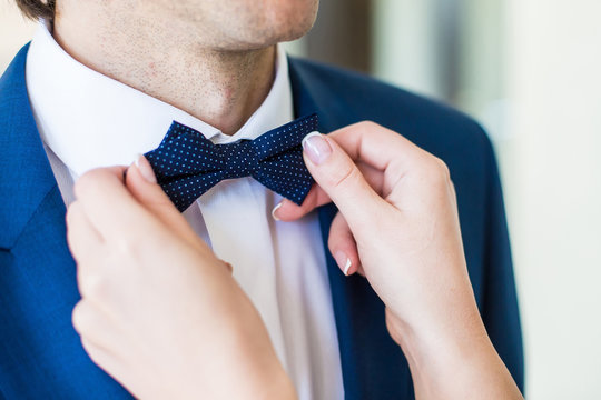 Bridegroom Adjusting His Bow Tie