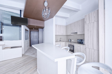 Russia, Moscow region - interior design kitchen - living room in luxury new apartment