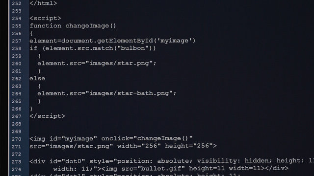 Software developer programming code on computer display. Abstract script code is listing in white letters in deep blue background.