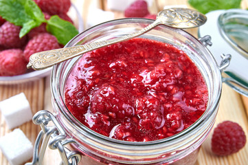 Raspberry jam in a jar. Homemade fruit jam