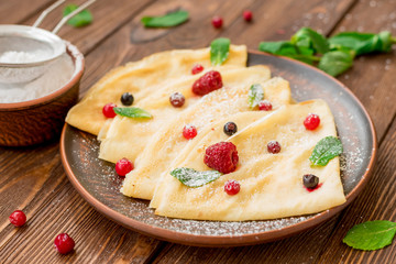 Vegetarian pancakes with fresh berries