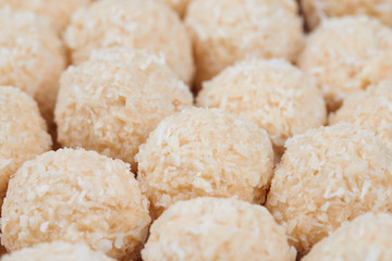 Pile of homemade sweets. Toffee and coconut balls