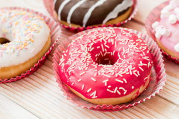 Homemade glazed and colorful donuts
