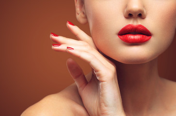 Obraz na płótnie Canvas Red Sexy Lips and Nails closeup. Open Mouth. Manicure and Makeup. Make up concept.