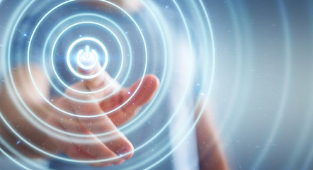 Businessman pushing 3D render power button with his finger