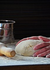 Pizza Dough on the dark background