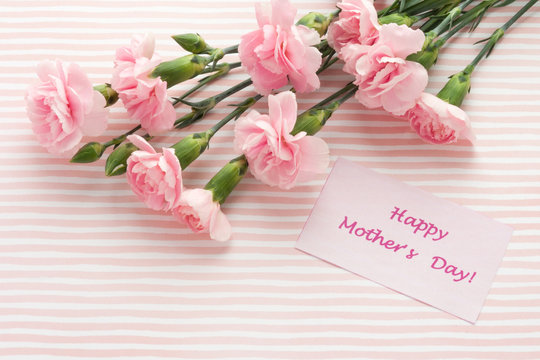 Mother's day greeting card. Bouquet of pink carnation.
