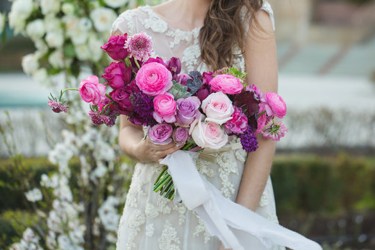 Bride With Beautiful Wedding Bouquet. Pink Rose And Other Flowers.