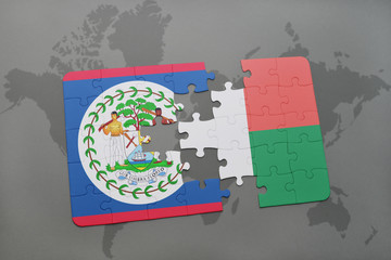 puzzle with the national flag of belize and madagascar on a world map