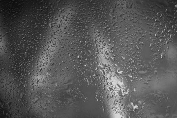 Drops of rain on glass