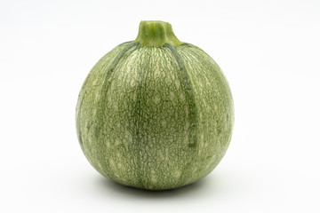 round zucchini on white background - courgette