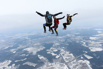 Skydivers make fun in the sky.