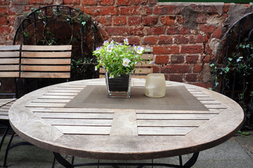 Table and chairs of small cafe.