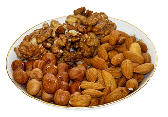dried fruit, nuts and honey on a plate