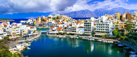 Landmarks of Greece - beautiful town Agios Nikolaos in Crete island - obrazy, fototapety, plakaty