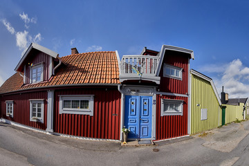 Row of ancient colorful wooden houses in the city of Karlskrona, Sweden