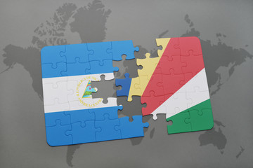puzzle with the national flag of nicaragua and seychelles on a world map