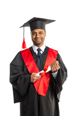 Male african american graduate in gown and cap