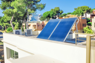 Solar panels on the roof of the house.