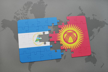 puzzle with the national flag of nicaragua and kyrgyzstan on a world map