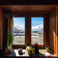 View from the window in high mountain lodge on the way to Renjo La pass in Everest region, Nepal