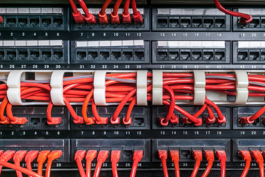 Server rack with red cables