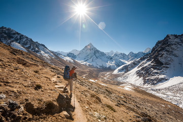 Trekker in Khumbu valley in front of Abadablan mount on a way to Everest Base camp