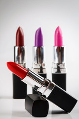 Lipsticks on white background