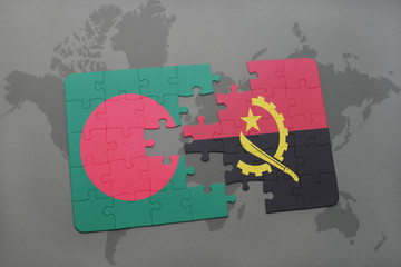 puzzle with the national flag of bangladesh and angola on a world map