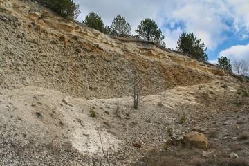 Field pebble agglomerates on the banks of the Dniester river near the urban-type settlement of Stara Ushytsya in Kamenetz-Podolsk district of Khmelnitsky region of Ukraine. March 2007