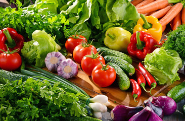 Composition with variety of fresh organic vegetables and fruits © monticellllo