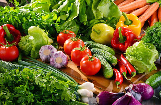 Composition with variety of fresh organic vegetables and fruits